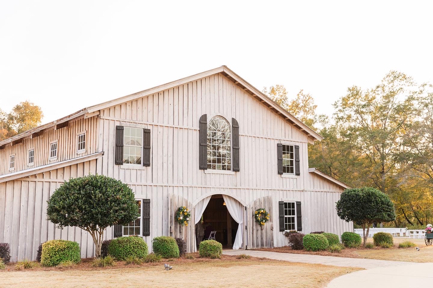 outside view of white wedding barn